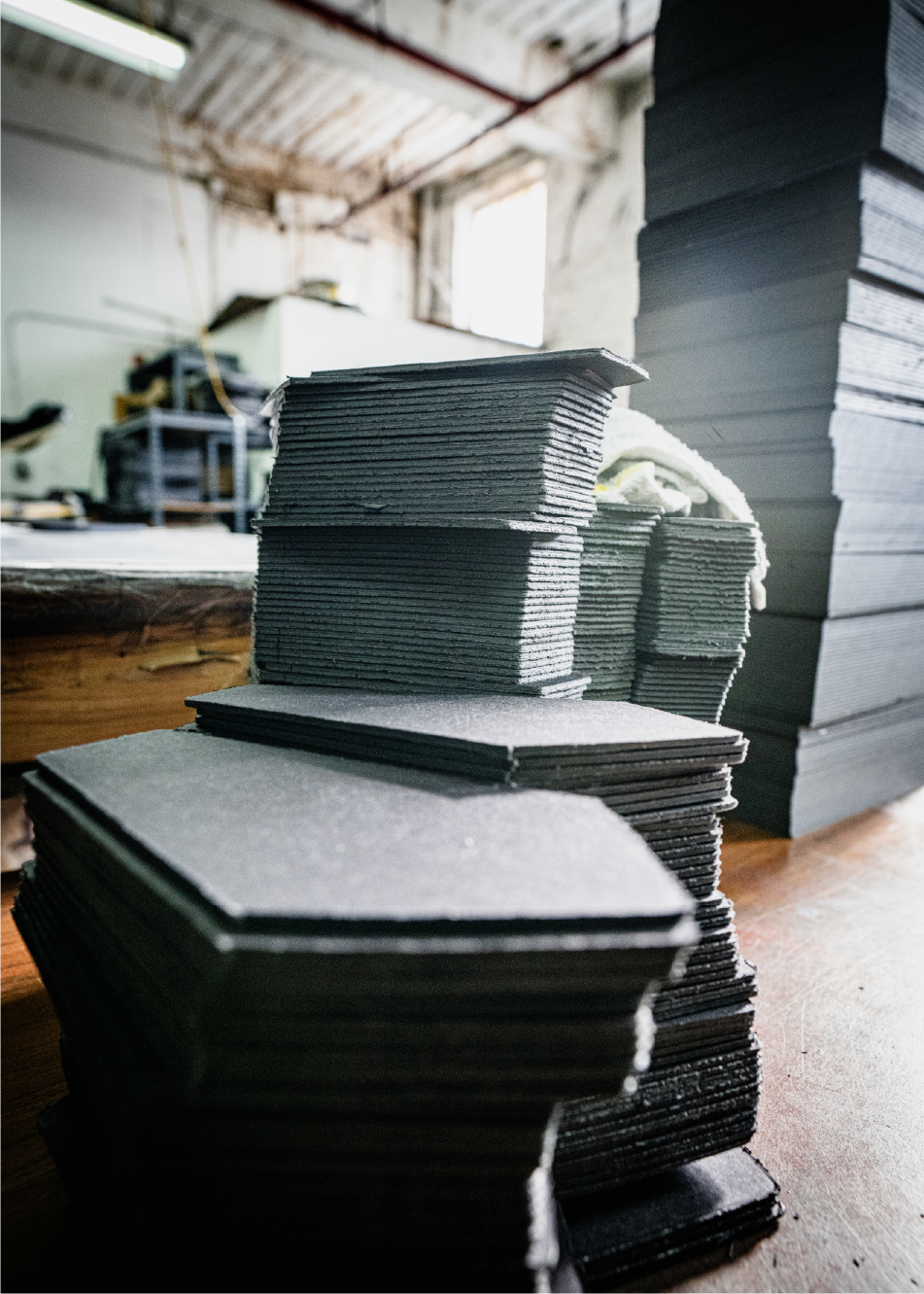 Stacks of cut mat board pieces